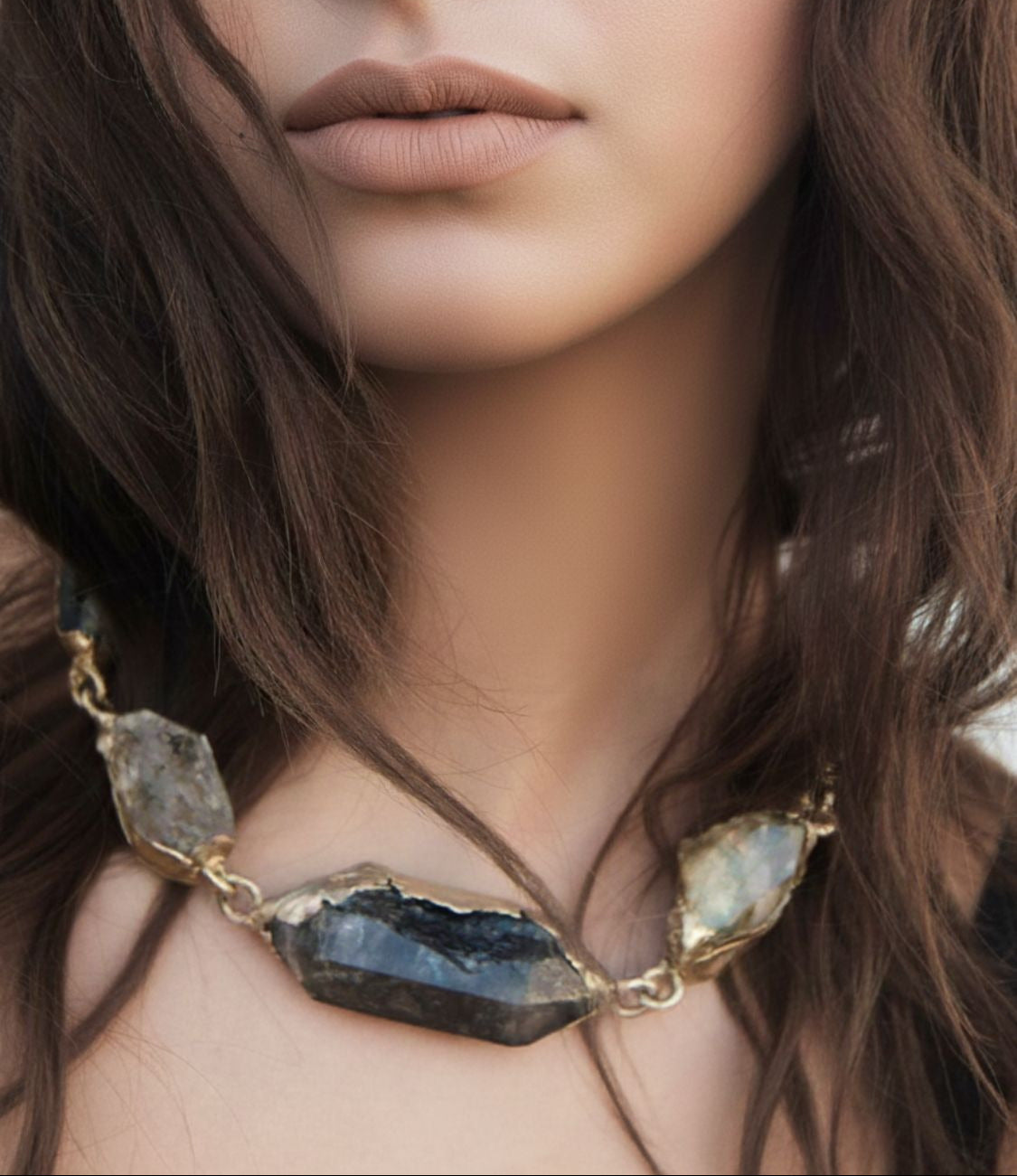 Close-up of a woman wearing Dark Feminine Necklace - The Bow Jewelry