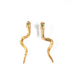 Gold snake-shaped earrings with emerald gemstones on a white background | The Bow Jewelry