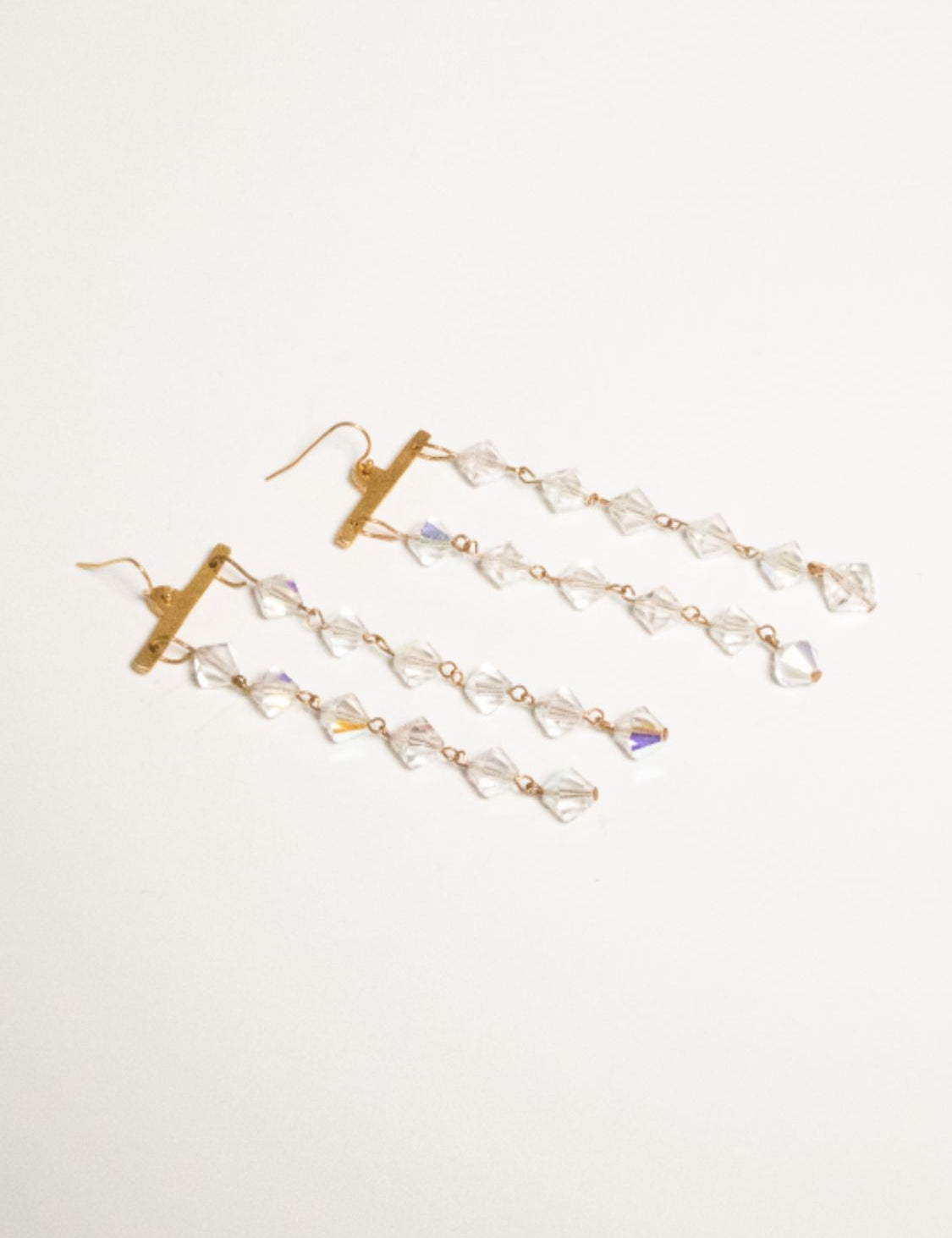 Pair of Fatale gold and crystal earrings | The Bow Jewelry