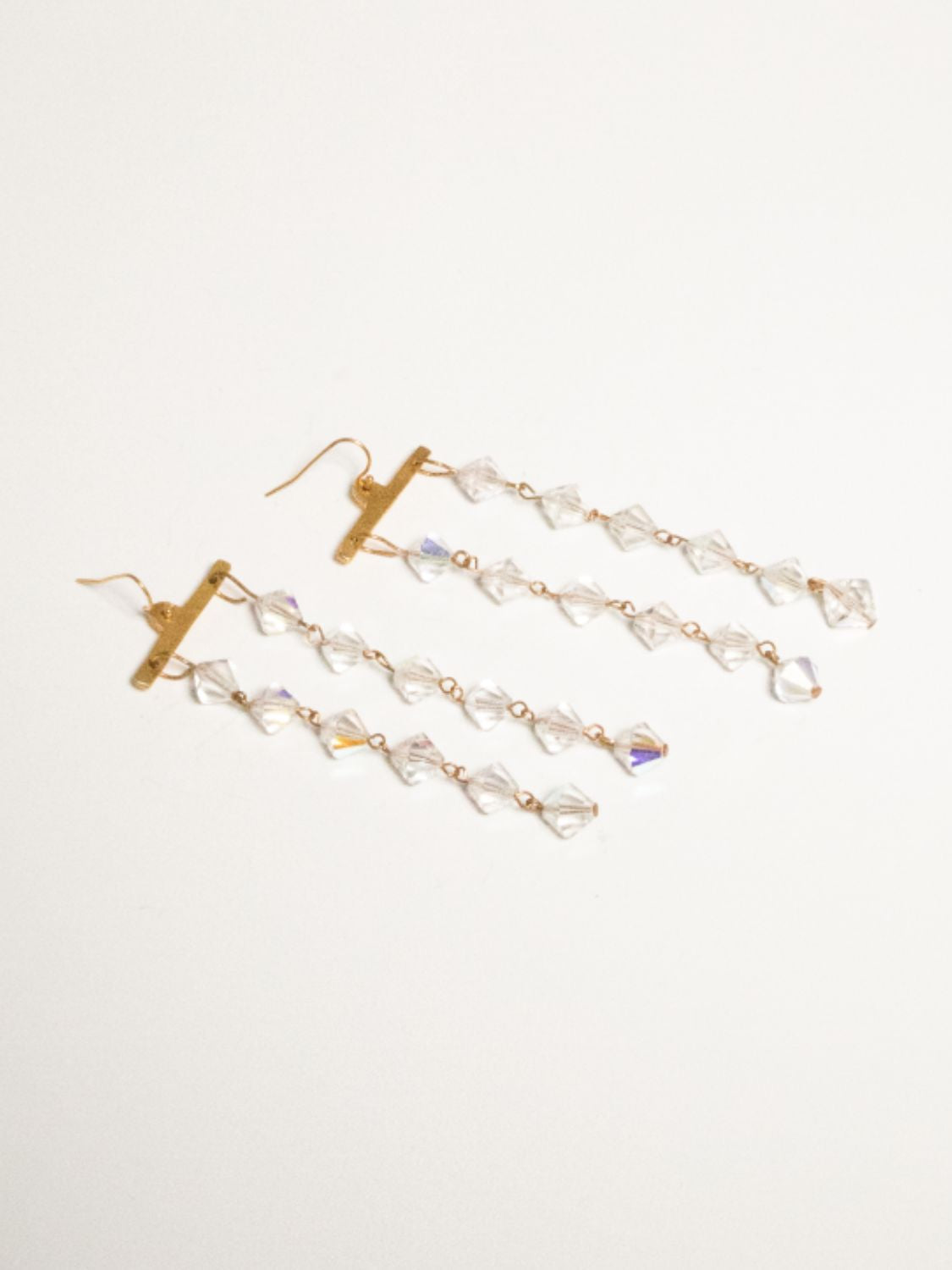 Pair of Fatale gold and crystal earrings | The Bow Jewelry