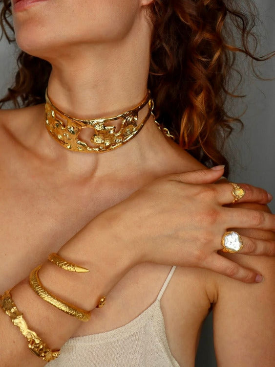 Model wearing The Bow Jewelry pieces