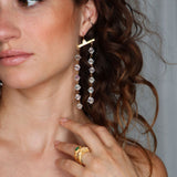 Model wearing Fatale gold and crystal earrings | The Bow Jewelry