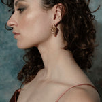 Scythian Arrow Earrings sculptural Jewelry on model profile | The Bow Jewelry