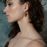 Scythian Arrow Earrings sculptural Jewelry on model profile | The Bow Jewelry