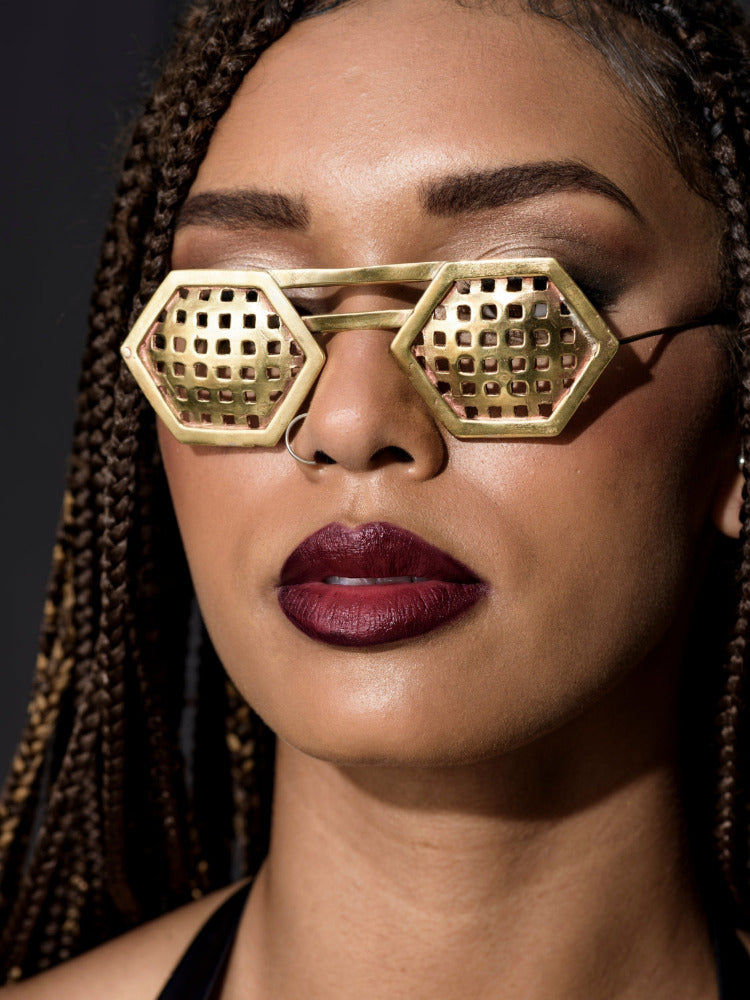 Model wearing pursuit sunglasses | The Bow Jewelry