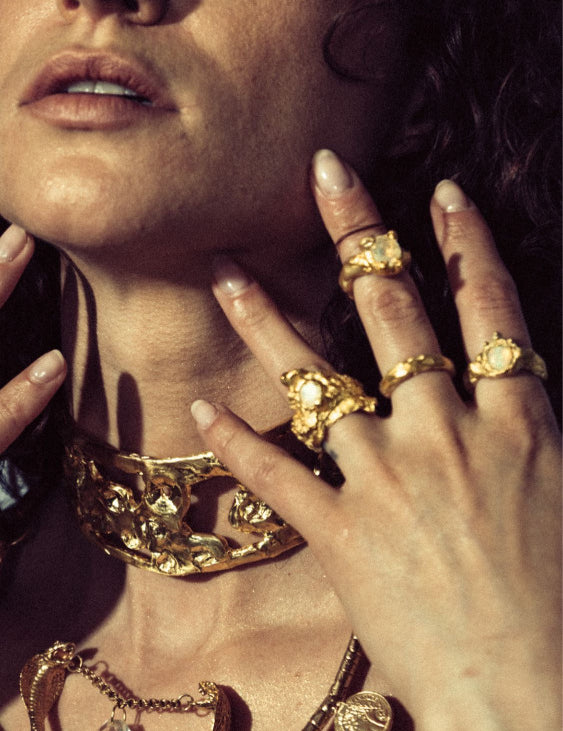 Close-up of Model wearing Divinity Moonstone, Nyx Moonstone, and Zodiac Ring | The Bow Jewelry