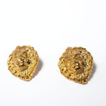 Gold lion head earrings on a white background | The Bow Jewelry