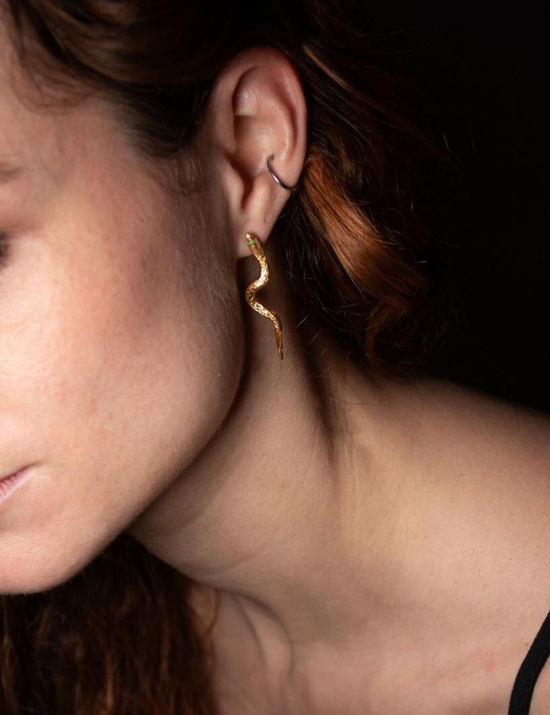 Close-up of model wearing Temptation Snake Emerald Earrings sculptural Jewelry | The Bow Jewelry