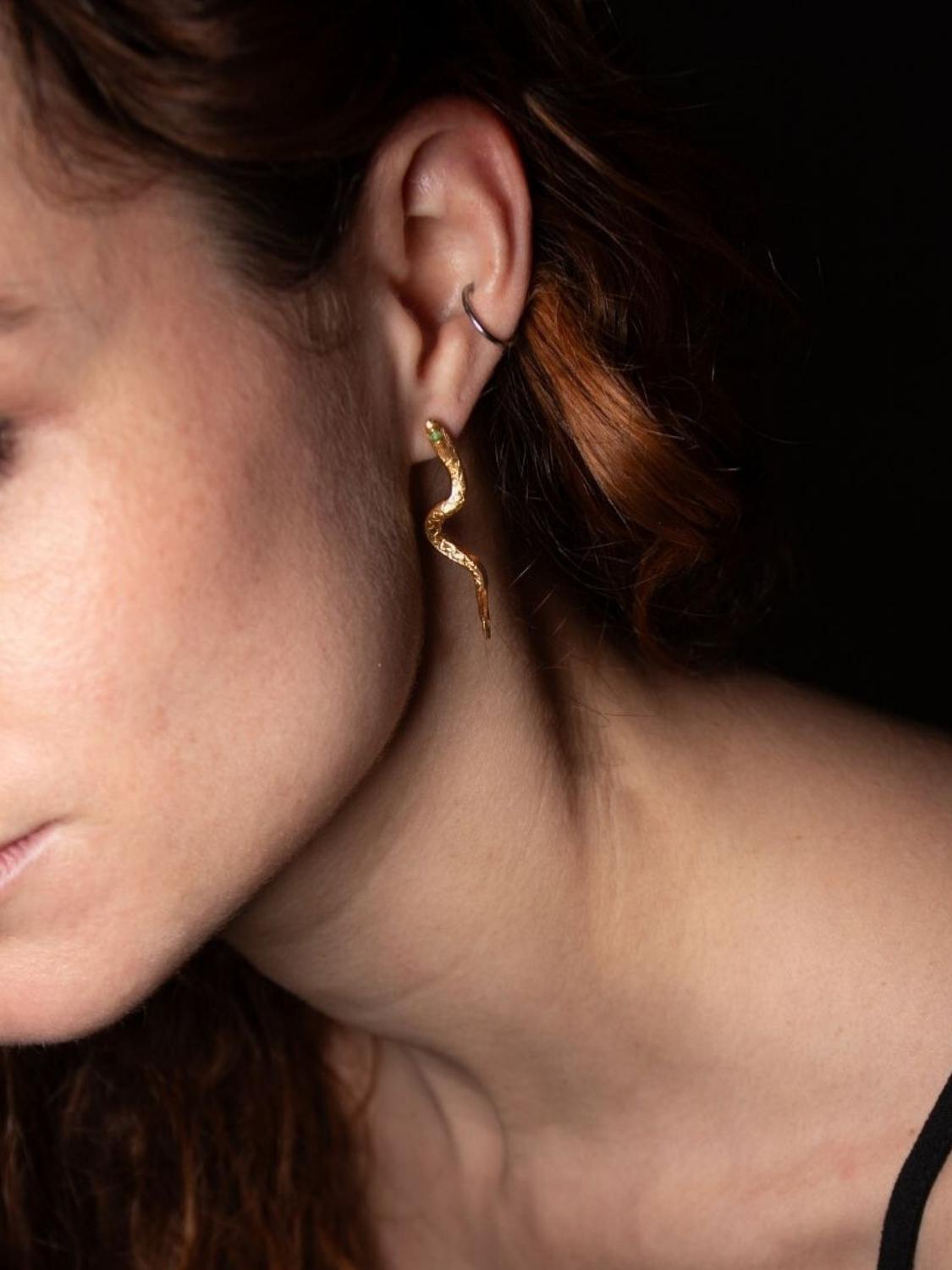 Close-up of model wearing Temptation Snake Emerald Earrings sculptural Jewelry | The Bow Jewelry