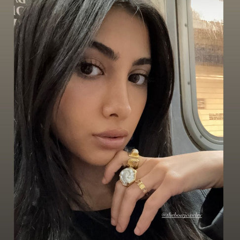 The Bow Customer in Aurora Ring