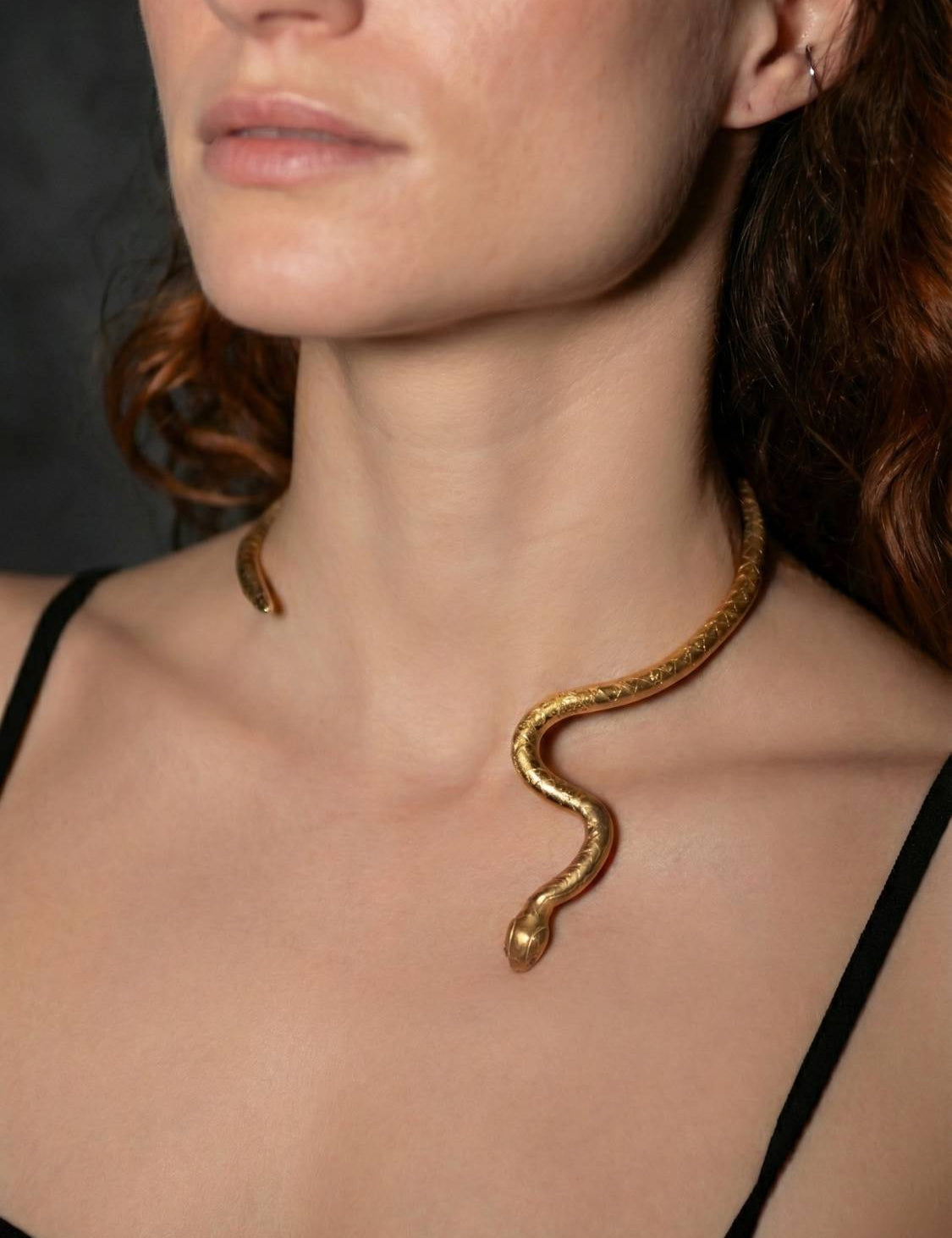 Model wearing Venom Ruby Neck Cuff sculptural Jewelry | The Bow Jewelry