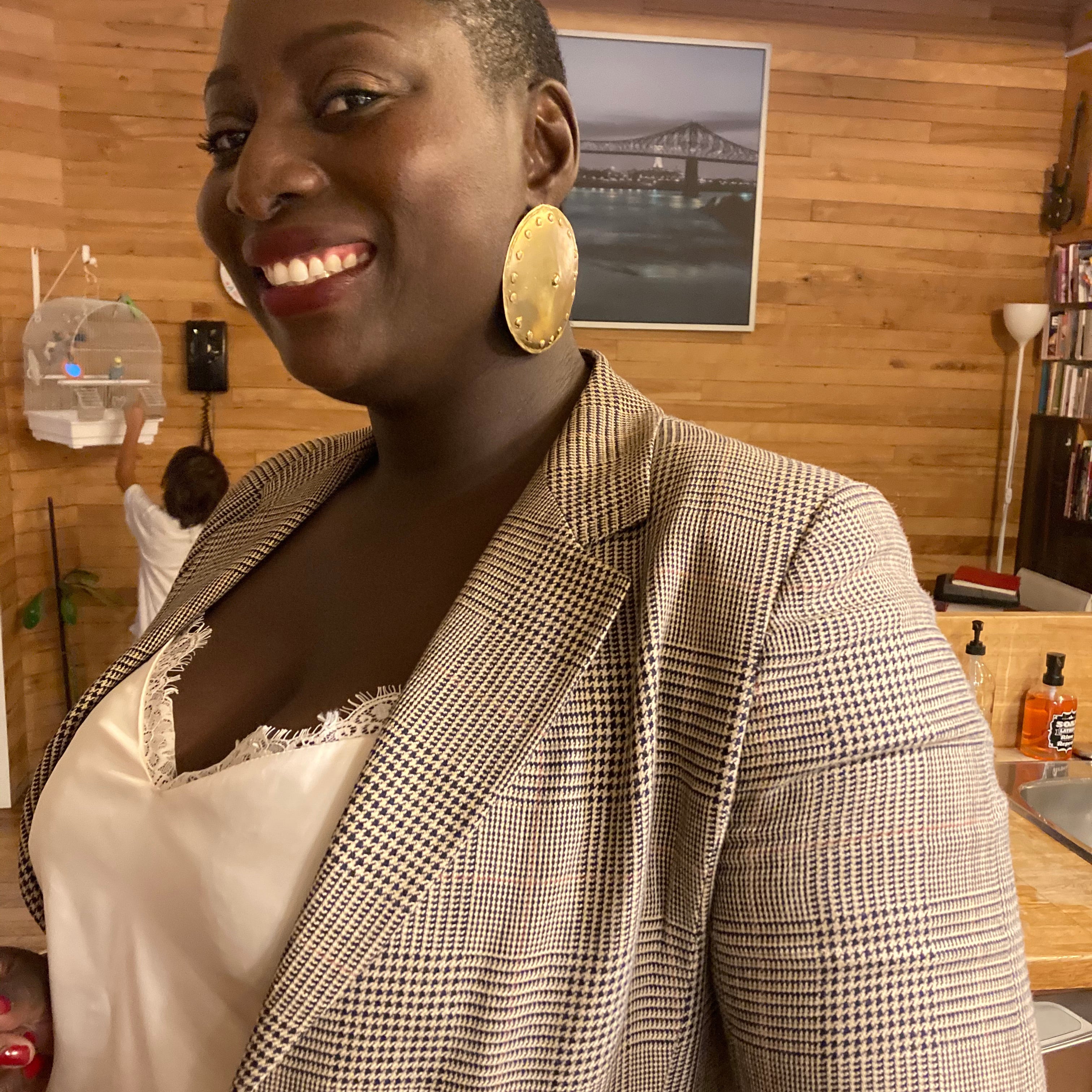 Client wearing shield earrings | The Bow Jewelry
