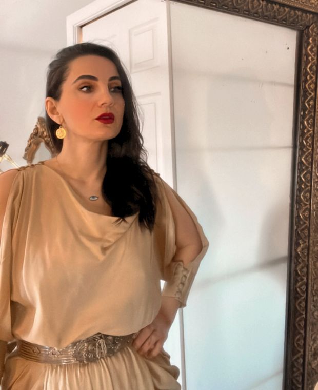 Woman in a beige dress with Warrior Artemisia Earrings | The Bow Jewelry