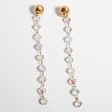A pair of gold-plate earrings with intricate crystal embellishments and a vintage chandelier design.