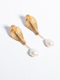 A pair of gold-plated brass earrings featuring baroque pearls and a cobra design on a white background | The Bow Jewelry