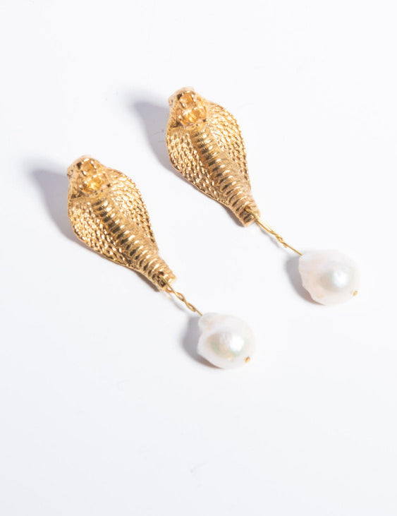 A pair of gold-plated brass earrings featuring baroque pearls and a cobra design on a white background | The Bow Jewelry