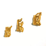 Set of gold finger tip rings on a white background  | The Bow Jewelry