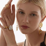 Aurora Pear Ring, Ascendant Earrings, Alchemist Finger Tip Ring on Model | The Bow Jewelry