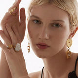 Aurora Pear Ring, Ascendant Earrings, Alchemist Finger Tip Ring on Model | The Bow Jewelry