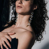 Model wearing Notorious Crystal Chandelier Earrings | The Bow Jewelry