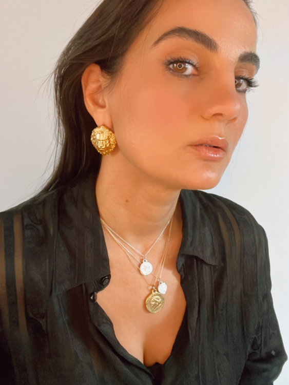 model wearing protector earrings